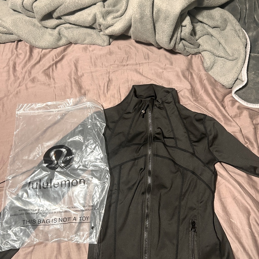 Brand new lululemon black jacket